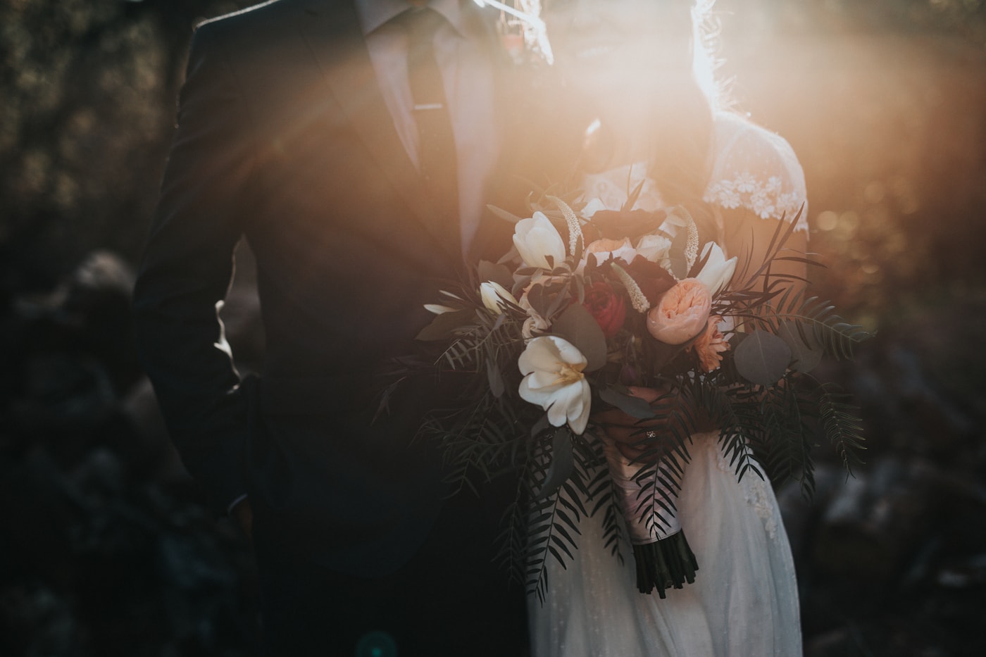 A bride and groom kissing